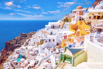 Beautiful picturesque Oia village on Santorini island, Greece with traditional white architecture