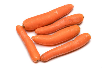 Raw carrot on white background.