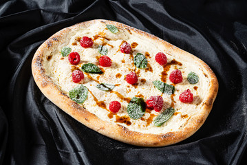 sweet pizza with raspberries and caramel