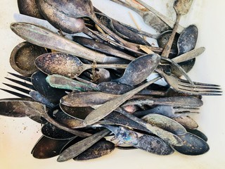 antique cutlery pile