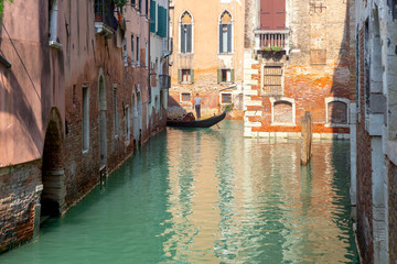 Fototapeta na wymiar Venice. Gondolier in the gondola.