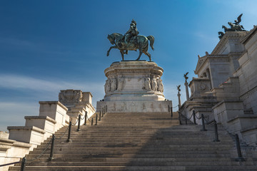 Obraz premium An equestrian sculpture of Victor Emmanuel II in Rome. Stairs leading to Victor Emmanuel II National Monument. No people.