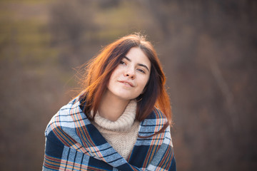 Fototapeta premium Portrait of beautiful young woman outdoors