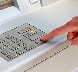 cash atm point dispenser with hand withdrawing money in town stock photography stock photo
