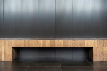 Wooden table with the wall background