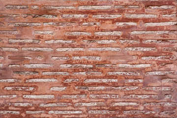Closeup wall of a medieval red castle