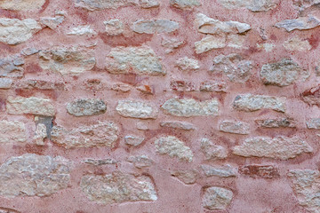 Closeup wall of a medieval red castle