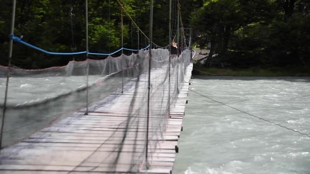 Bridge Crossing While Backpacking in Torres del Paine National Park in Chilean Patagonia 