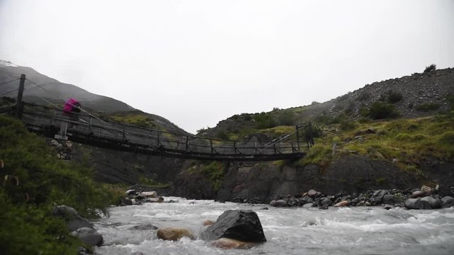 Bridge Crossing While Backpacking in Torres del Paine National Park in Chilean Patagonia 