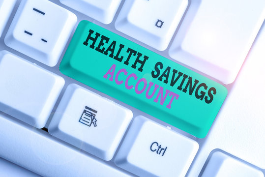 Handwriting text writing Health Savings Account. Conceptual photo users with High Deductible Health Insurance Policy White pc keyboard with empty note paper above white background key copy space