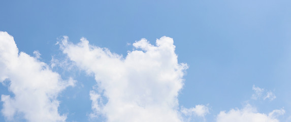 Blue sky with white fluffy clouds for background'panorama view