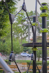 Details: net and climbing devices for children in the playground, close-up