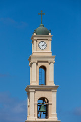 Fototapeta na wymiar Closeup view on top part of bell tower of monastery saint Peter