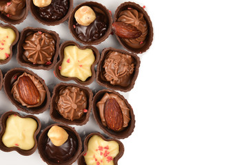 Mix of tasty chocolate candy collection isolated on white. Copy space.