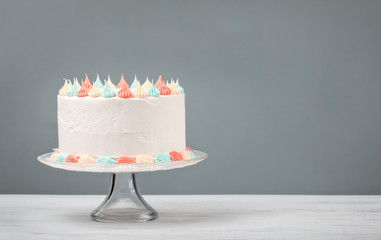 white Birthday Cake with pastel icing