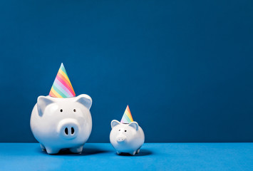 Piggy Banks wearing Birthday Party Hats - 295130160