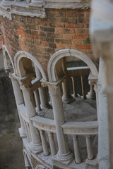 Venice, part of the tower of the palace of Contarini del Bovolo, arches and spiral staircase.