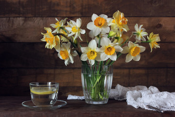 bouquet of daffodils and lemon. spring