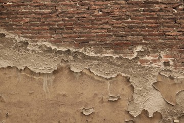 old brick wall, peeling putty