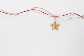 Christmas composition. Star rope ribbon top view background with copy space for your text. Flat lay.