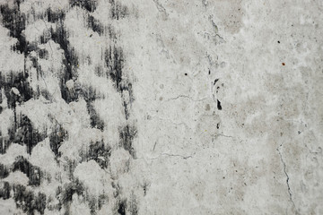 black and white abstract background, white marks on the street, cracked and painted