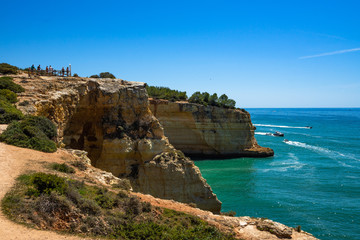 Fototapeta na wymiar Imposing cliffs of Algarve overlooking the Atlantic Ocean above the Benagil cave, Lagoa, Portugal
