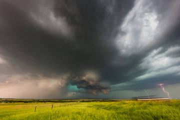 Bolts of lightning hit the ground during a lightning storm.