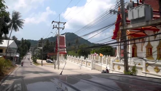 Driving on Koh Pha Ngan Island in the Chumphon Archipelago in Southern Thailand