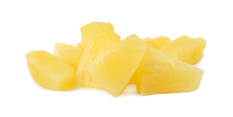 Fototapeta na wymiar Pieces of delicious sweet canned pineapple on white background, closeup