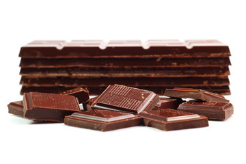 Dark Chocolate Tablet Stack and Bars. Isolated on white backgrou
