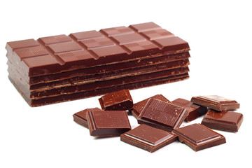 Dark Chocolate Tablet Stack and Bars. Isolated on white backgrou