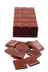 Dark Chocolate Tablet Stack and Bars. Isolated on white backgrou