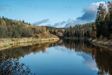 Fototapeta na wymiar beautiful natural lake or river in autumn