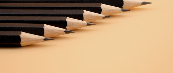 Obraz premium Pattern of Pencils from top view of accessories for lifestyle, background from pencils on paper of office desk concept.
