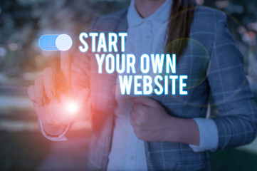 Text sign showing Start Your Own Website. Business photo showcasing serve as Extension of a Business Card a Personal Site Woman wear formal work suit presenting presentation using smart device