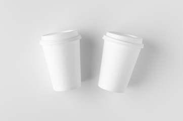 Top view of a 12 oz. white coffee paper cup mockup with lid.