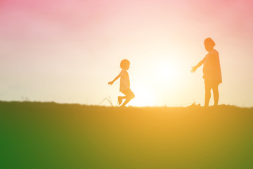 kid silhouette,Moments of the child's joy. On the Nature sunset
