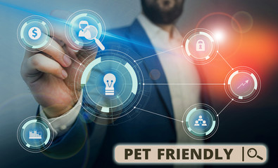 Word writing text Pet Friendly. Business photo showcasing used to describe a place that is suitable or allowed for pets Male human wear formal work suit presenting presentation using smart device