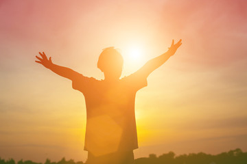 kid silhouette,Moments of the child's joy. On the Nature sunset