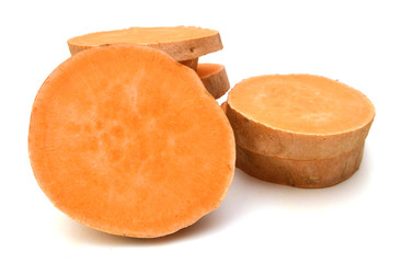 a cut sweet potato on a white background