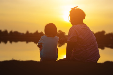 kid silhouette,Moments of the child's joy. On the Nature sunset