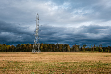 storm clouds over asphalt road in perspective