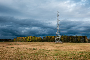 storm clouds over asphalt road in perspective
