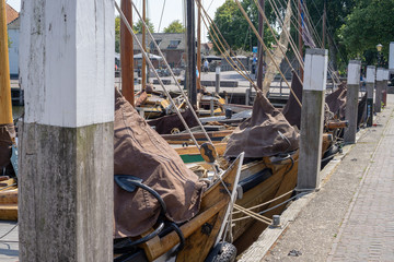 Old tradional boats at the Havankade (harbor quay) in Elburg, Gelderland, NLD