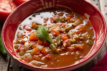 Mexican style lentil soup with tomato and nopal cactus