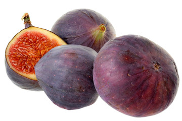 Sliced ​​figs closeup isolated on a white background.