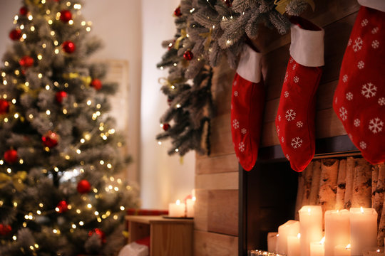 Stylish room interior with decorative fireplace. Christmas time - Powered by Adobe
