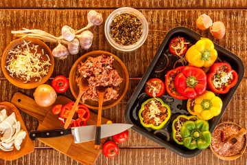 Colorful baked with cheese, stuffed peppers with minced meat. Top view. Minced meat and vegetables