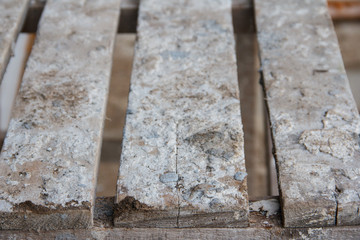 Old wooden boards on a building floor. Industrial background