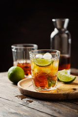 Strong golden rum with lime and ice